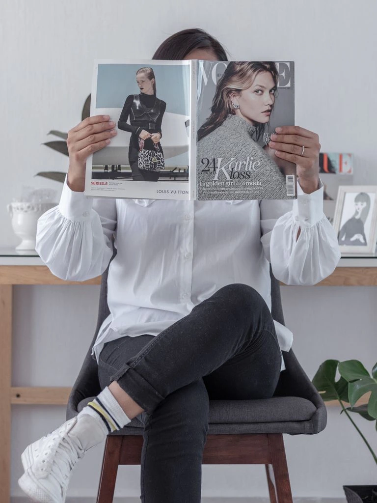 A senior Arab businesswoman photographed in a sunlit Gulf office for the 2025 ranking cover.